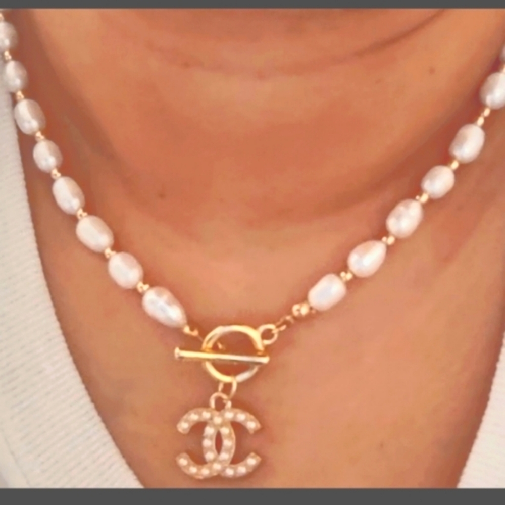 Pearl Chanel pendant necklace , brand new .